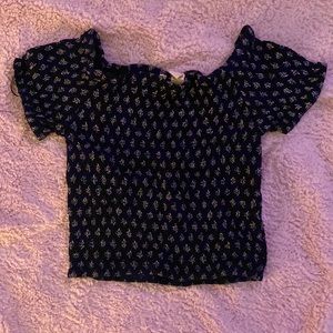 navy ruched top with white floral design